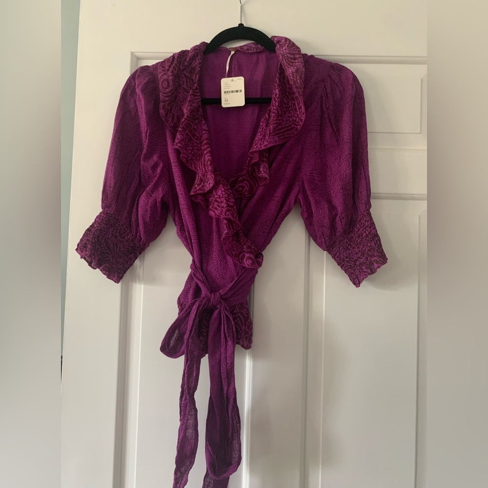 Free people Wrap Top New with Tags. Size M